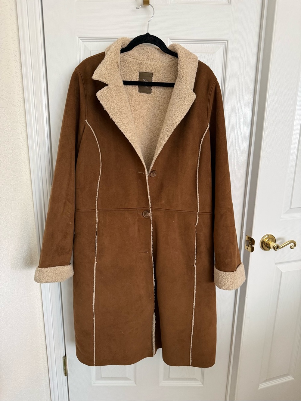Old Navy brown faux suede coat featuring a cozy cream sherpa lining and contrast